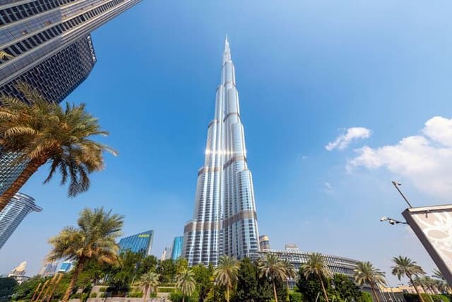 Dubai Tour Visit to the 124th/125th floor of the Burj Khalifa, visit to the Dubai Mall and dinner on the Marina Dhow cruise with private transfers